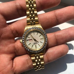 Women’s Citizen Gold Tone stainless bracelet watch